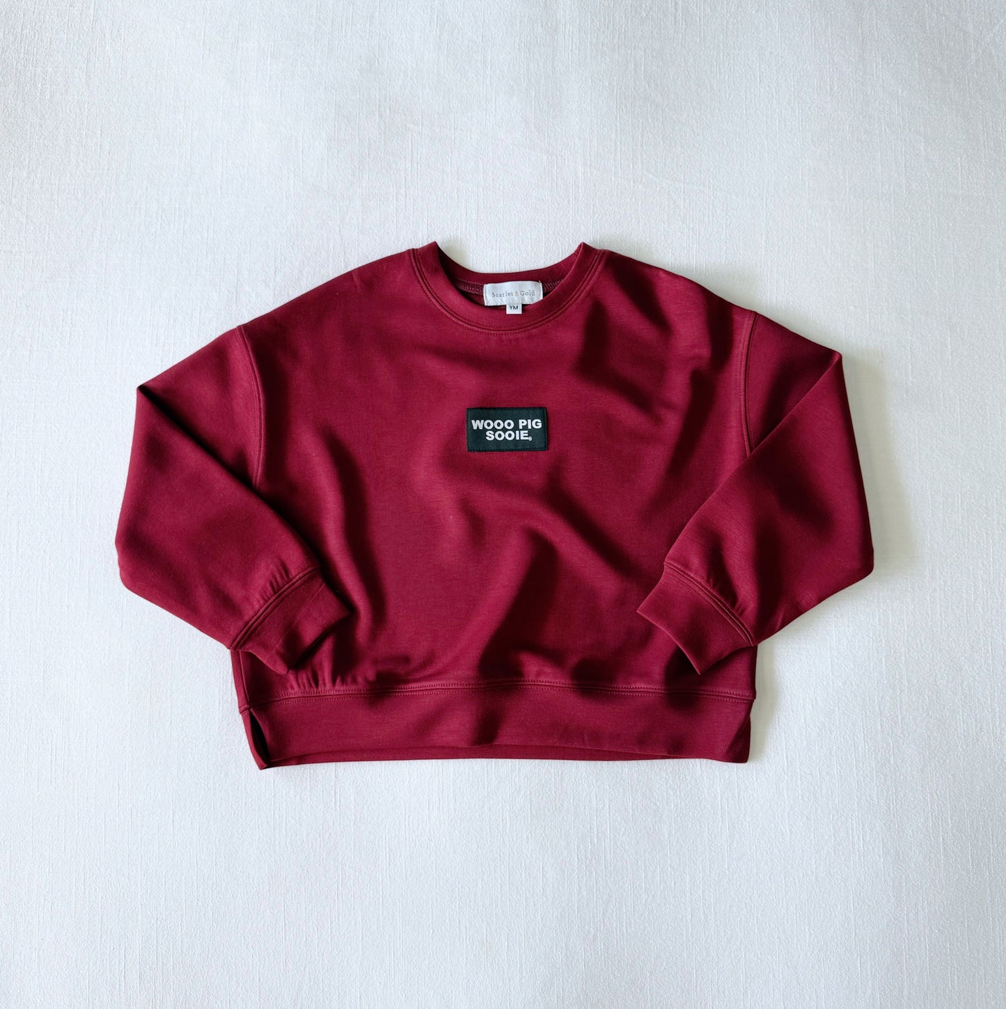 The Ava Airy Crewneck Woo Pig Woven Label | Crimson